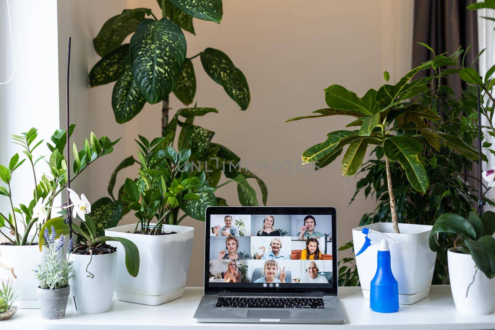 white desk and video chat online via a laptop. Video call, blogging. Workplace.