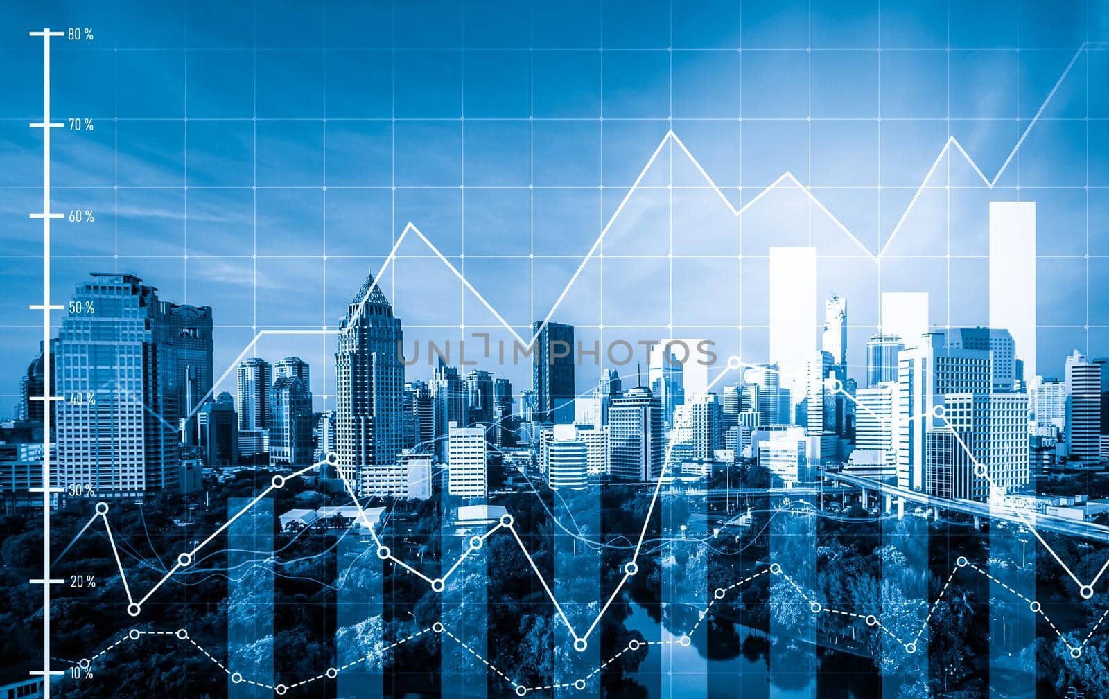 Financial graphs and modernistic cityscape as background for business concept. by biancoblue