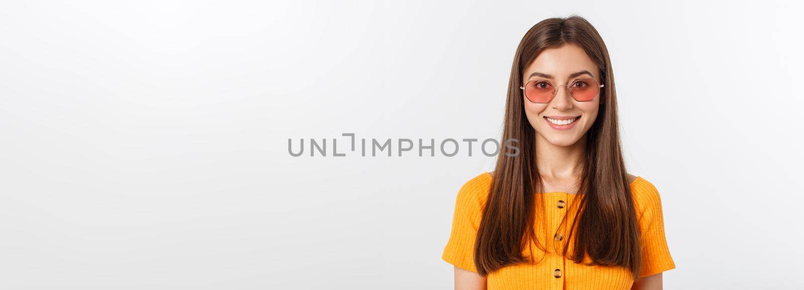 Fashion girl hipster in glasses. White background isolated. by Benzoix