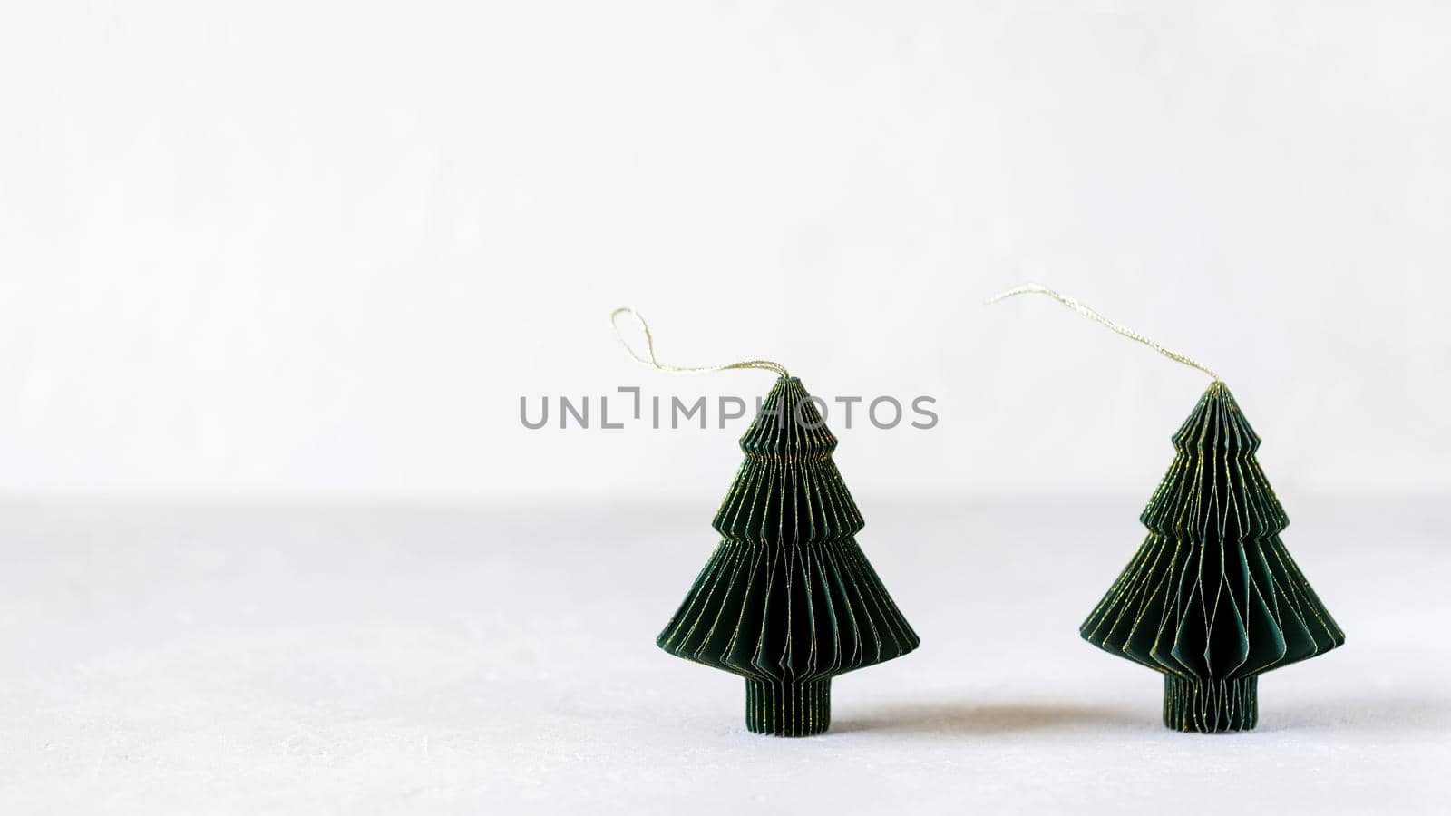 Christmas fir trees paper decoration, side view, copy space