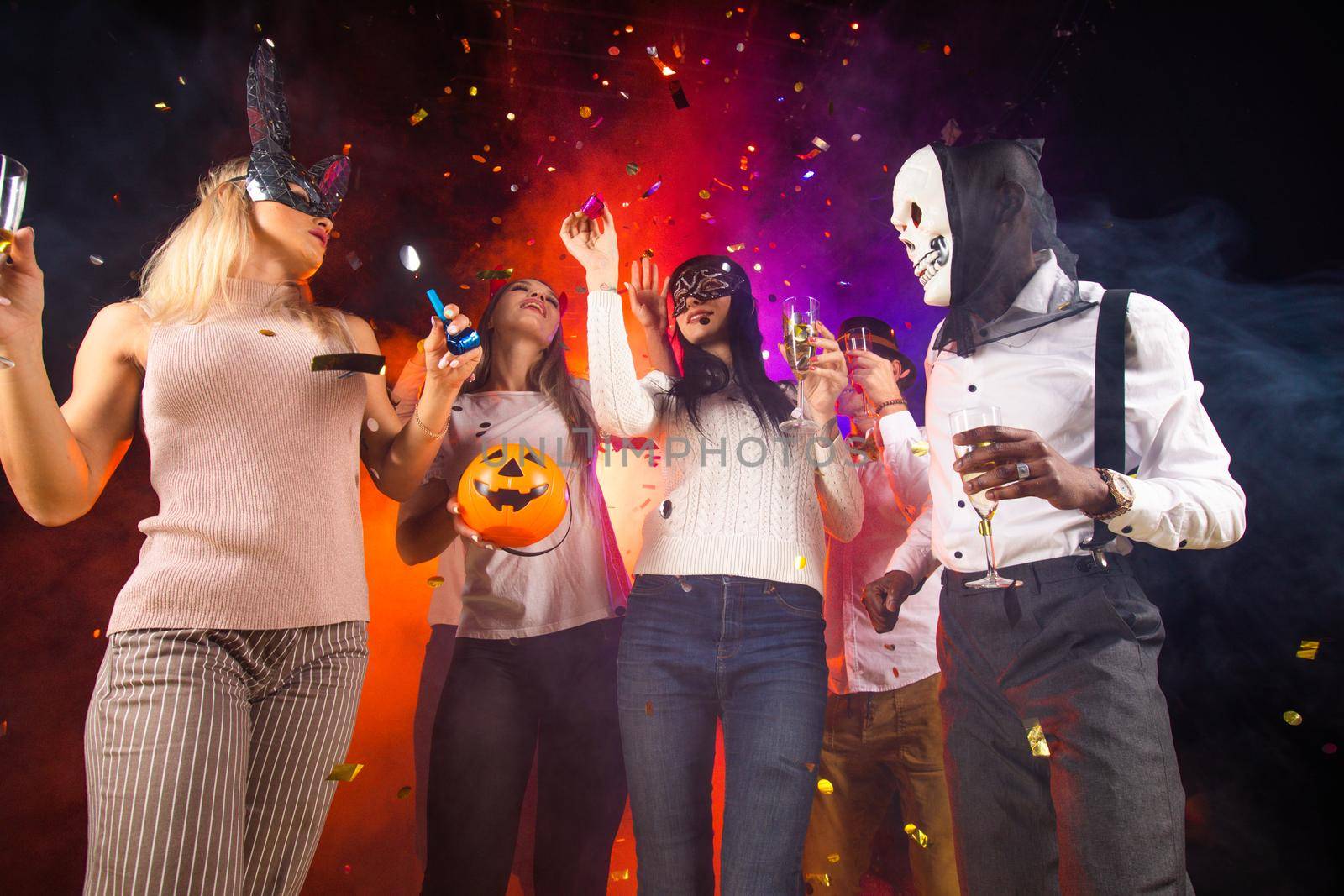 People dance at Halloween party by ALotOfPeople