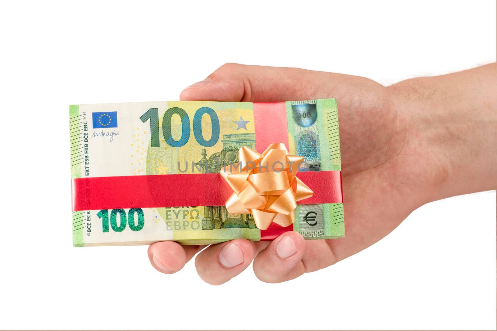 Gift of money. A pack of 100 euro bills in a male hand is isolated on a white background. Money gift concept for birthday or christmas