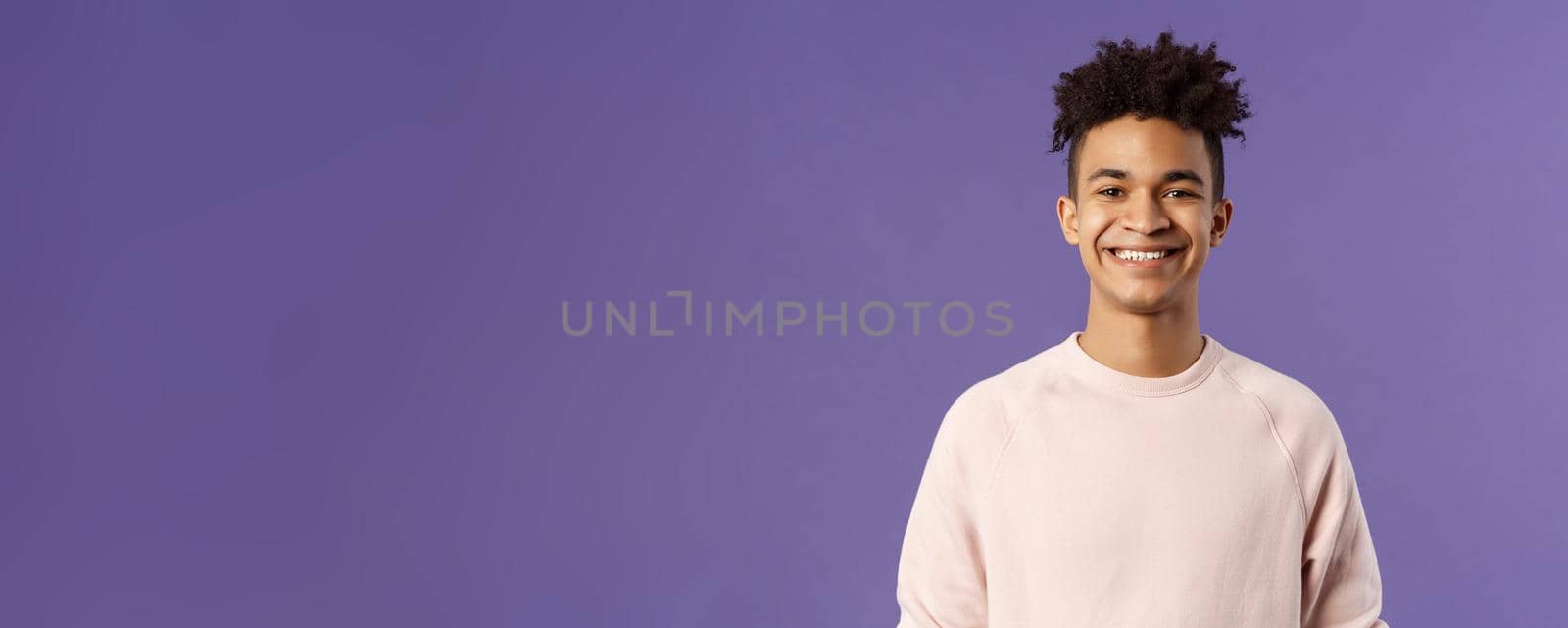 Close-up portrait of cheerful young hipster guy with dreads, smiling optimistic and delighted, standing purple background, having lucky good day, express positivity and joy by Benzoix