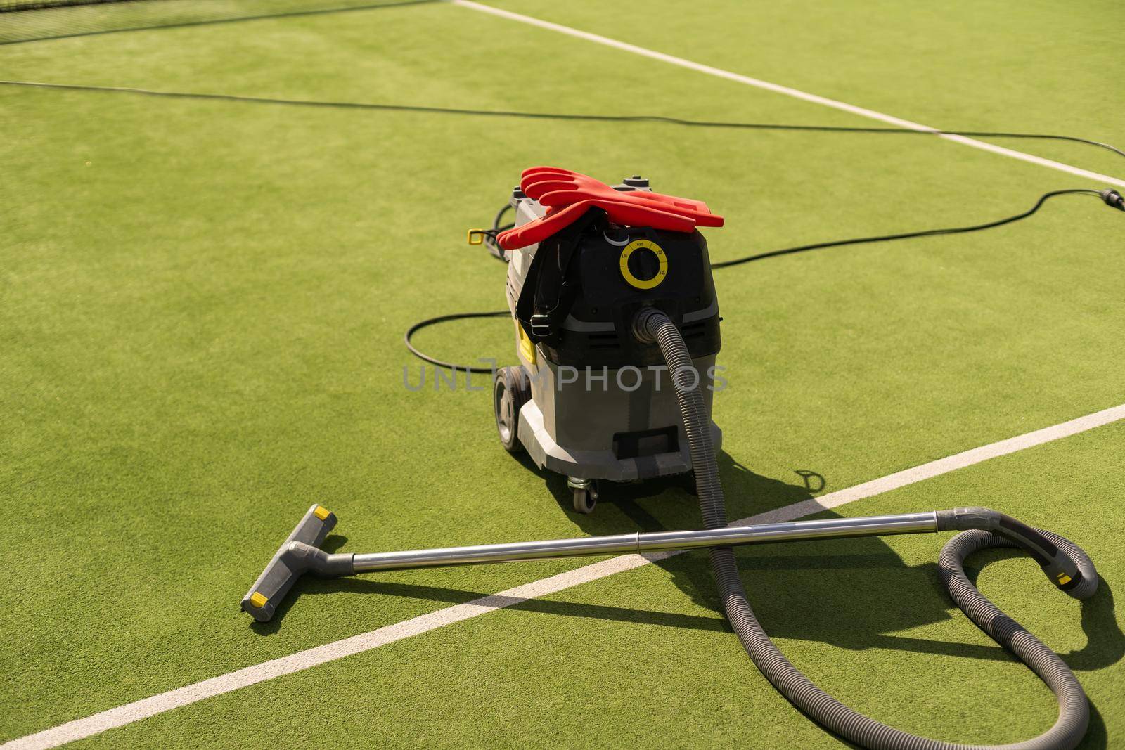 vacuum cleaner for the tennis court.