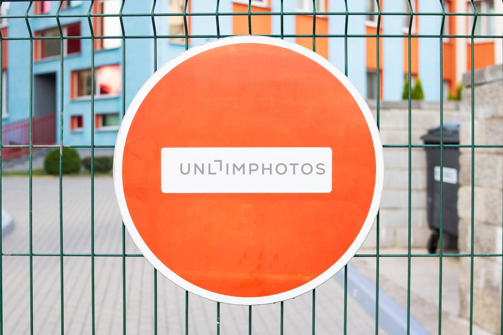 Road sign travel is prohibited on the fence close up