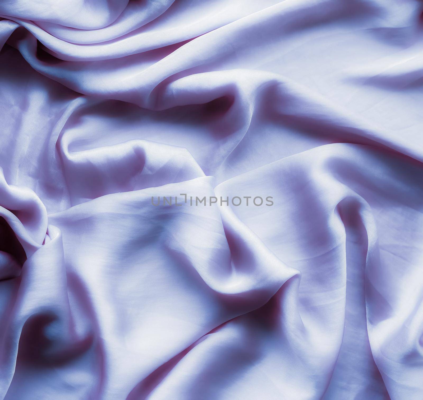 Elegant fabric texture, abstract backdrop and modern pastel colours concept - Purple soft silk waves, flatlay background