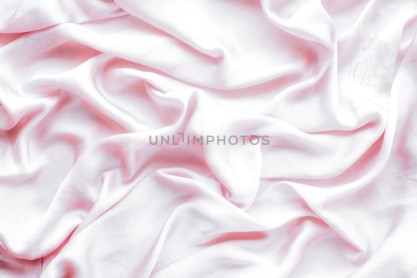 Elegant fabric texture, abstract backdrop and modern pastel colours concept - Pink soft silk waves, flatlay background