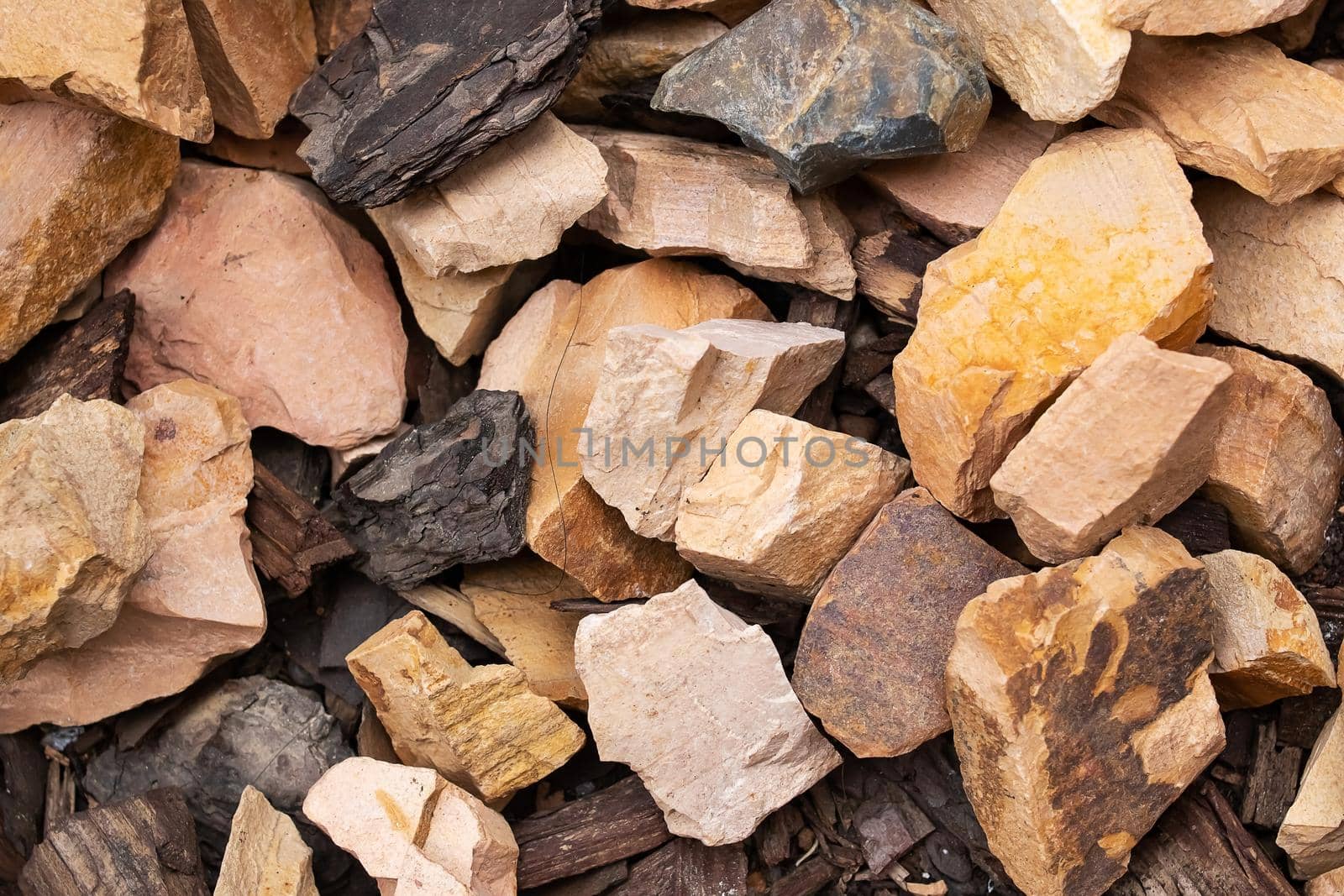 A bunch of different stones close up, background or texture