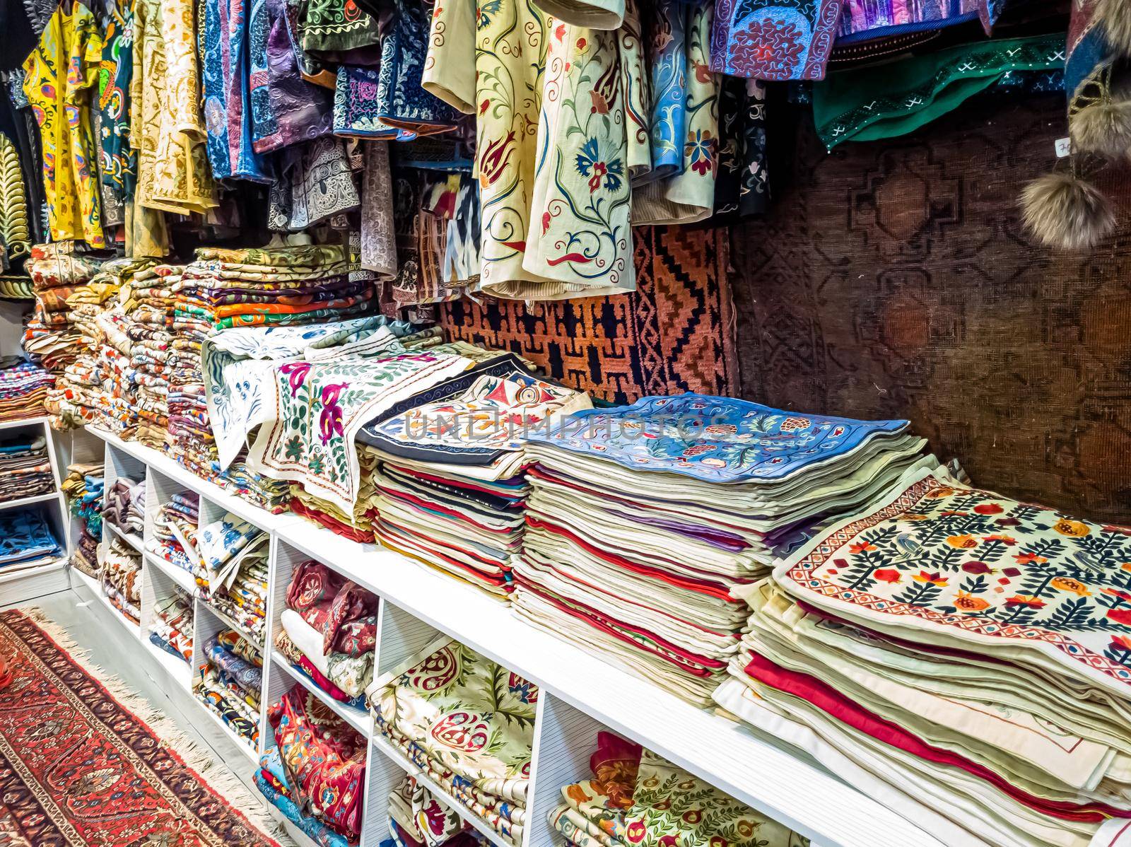 Traditional Asian cloth sold in a store in the Historic Centre of Uzbekistan by Milanchikov