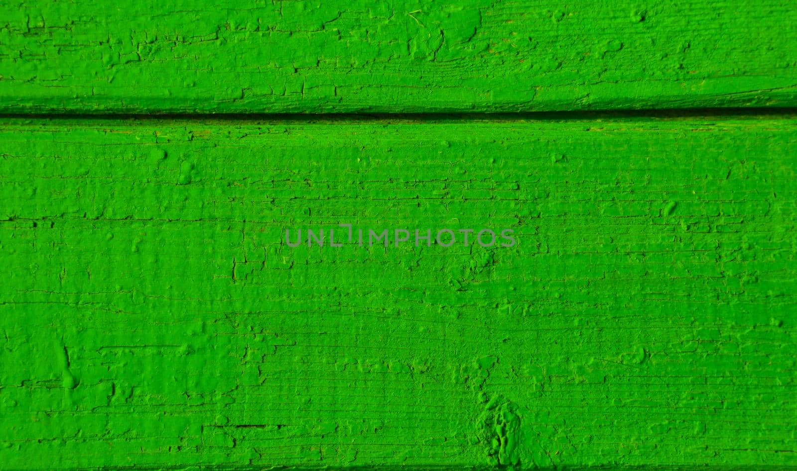 Wood texture. An abstract background of green planks.