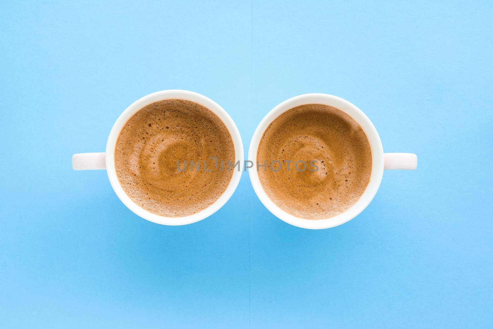 Hot aromatic coffee on blue background, flatlay by Anneleven