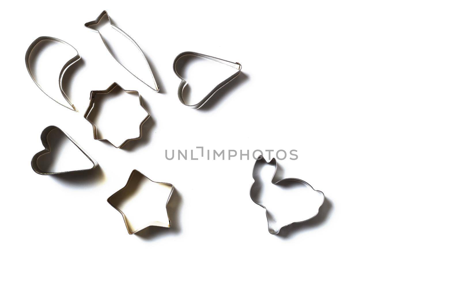 Metal cookie cutters on a white background. Copy space