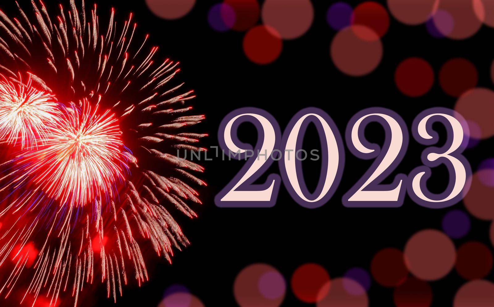 Happy new year 2023, festive red fireworks on background black sky with bokeh and copy space. Concept of holiday