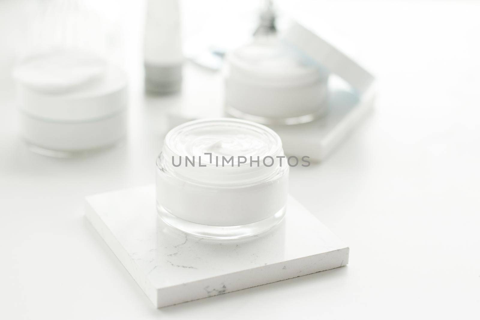 Luxury skincare cosmetics in a bathroom by Anneleven