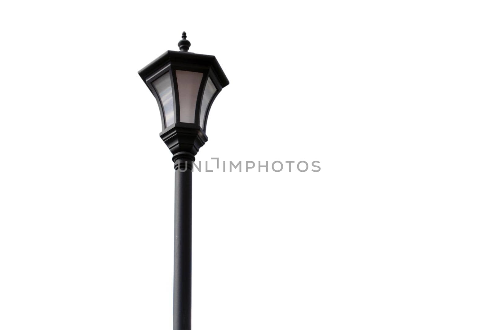 Old street lamp close up. Isolated object on a white background.