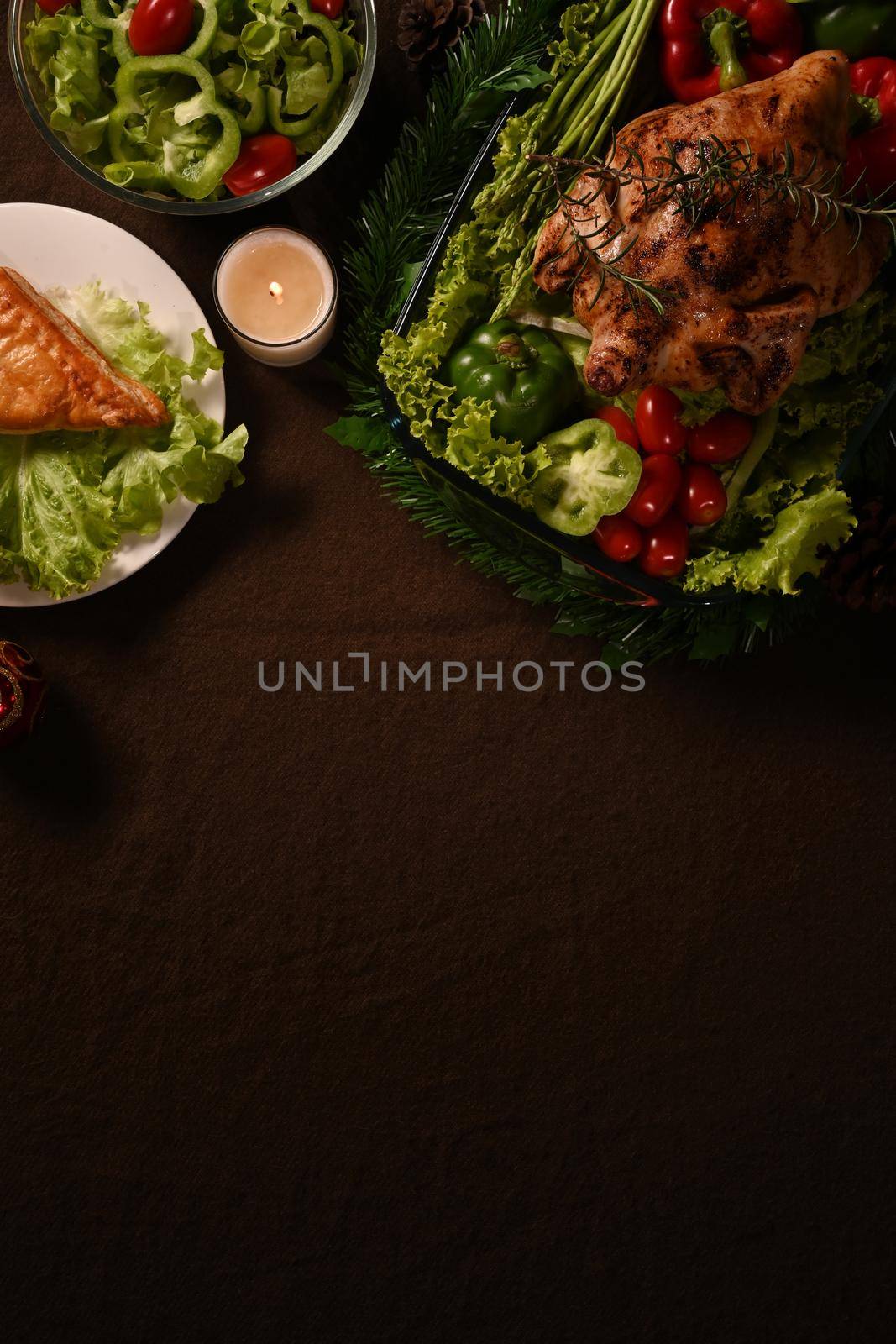 Thanksgiving dinner background with roasted turkey or chicken and all sides dishes. Thanksgiving celebration traditional dinner concept by prathanchorruangsak