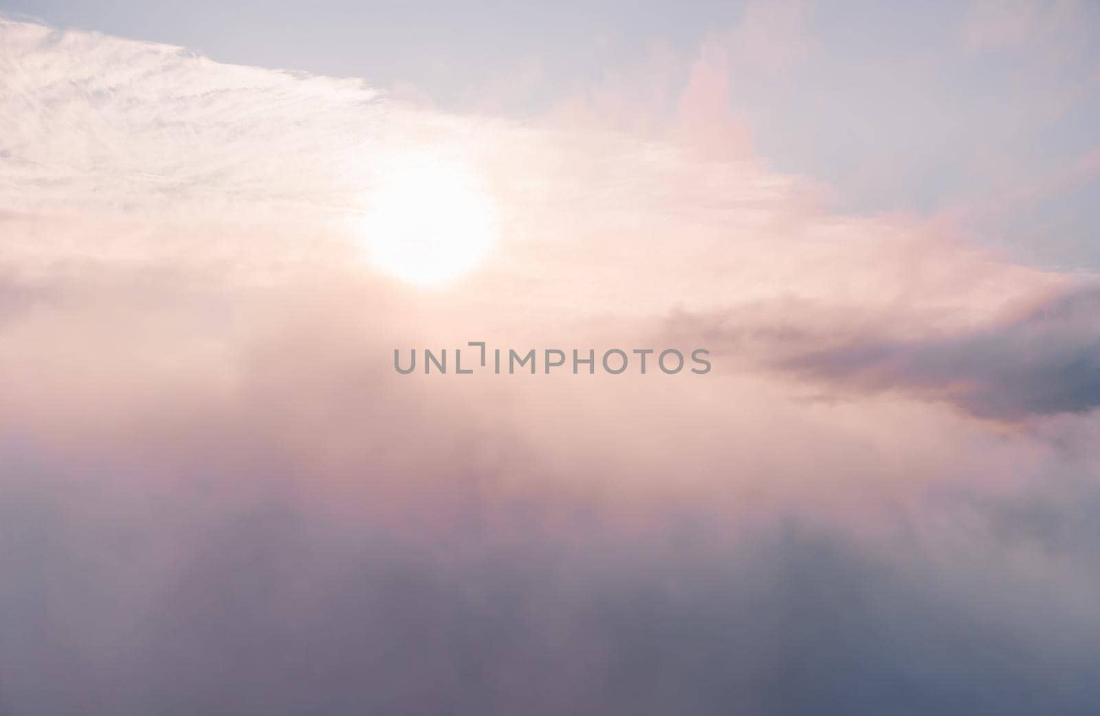 Aerial view drone flying above white clouds dense fog move quickly. Drone flies high back in blue sky through fluffy clouds. Beautiful foggy and cloudy slow moving Aerial view. Fog sea.