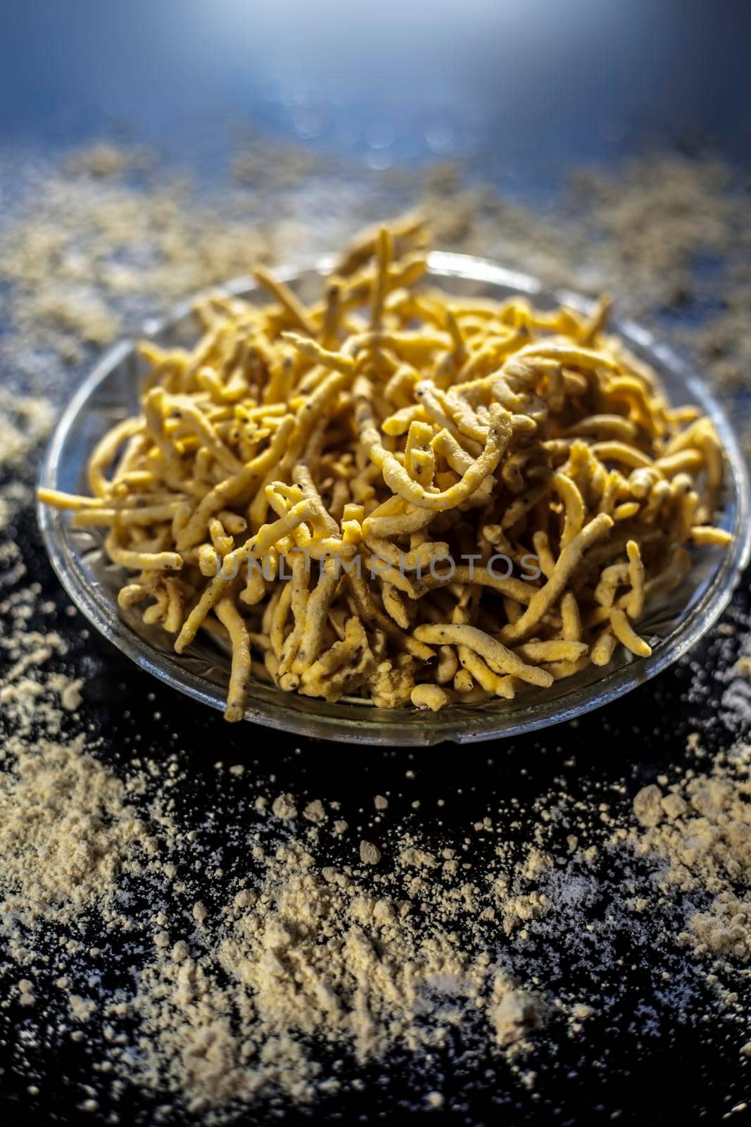 Close up shot of Gujarati famous tea-time snack dish Bhavnagiri gathiya in a serving plate. Shot of freshly prepared thikkha bhavnagari gathiya in a serving plate.