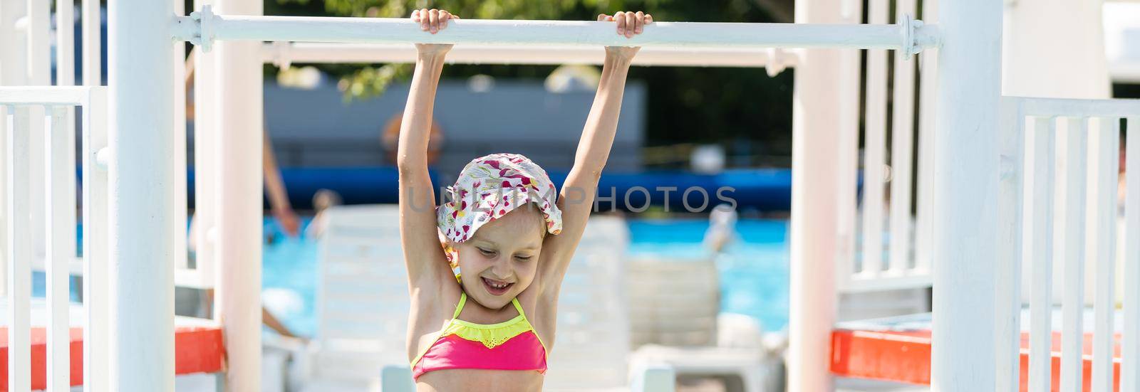 Swimming - little girl playing in blue water by Andelov13