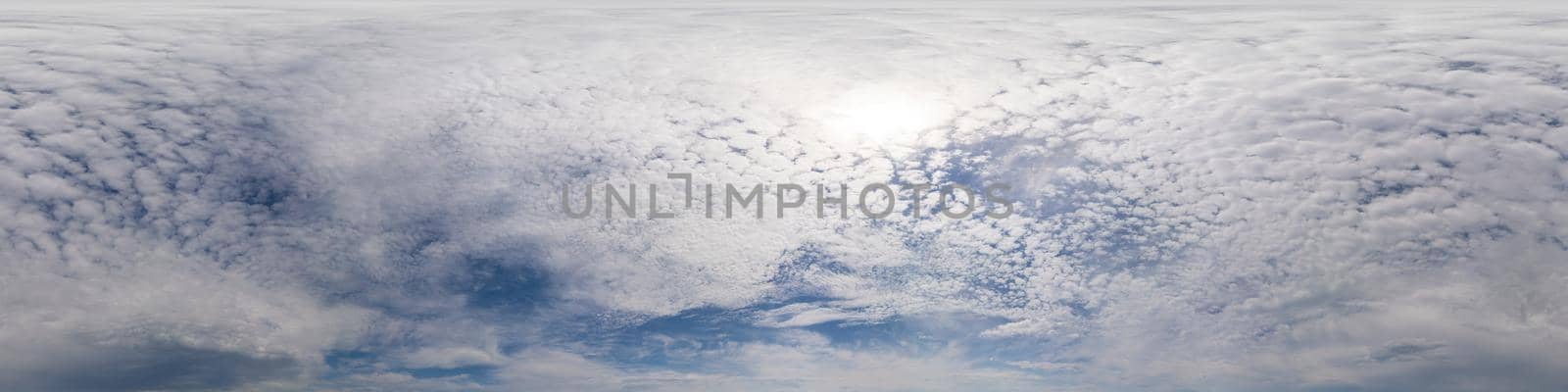 Blue sky with Cumulus clouds Seamless panorama in spherical equirectangular format. Complete zenith for use in 3D graphics, game and for composites in aerial drone 360 degree panoramas as a sky dome.