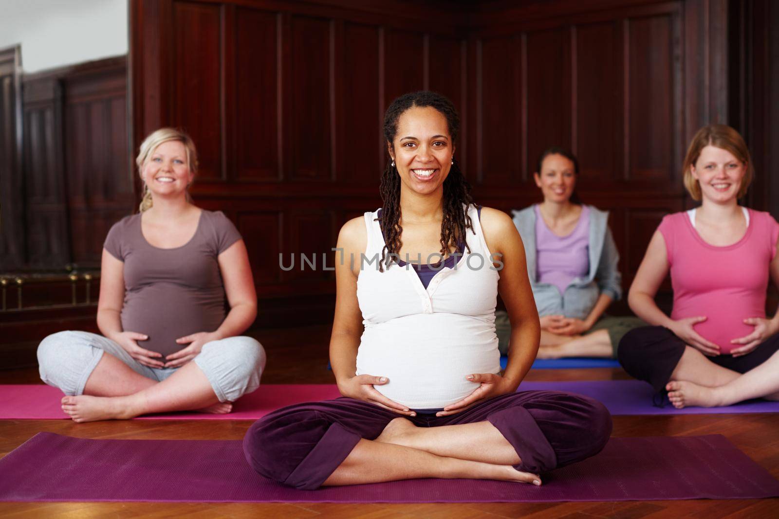 Portrait of happy pregnant women in yoga with leader or teacher teaching in training or class for fitness and meditation. Pilates exercise or workout with group for pregnancy wellness and health body.
