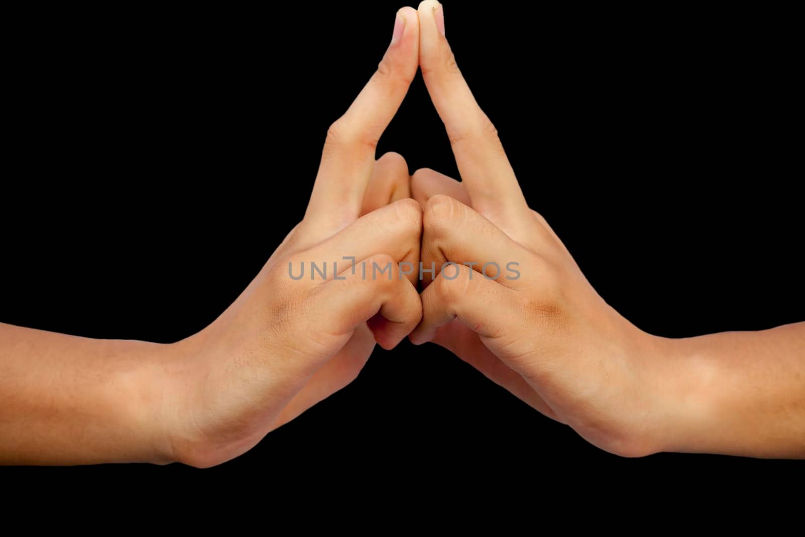 Shot of male hands isolated on black background demonstrating Kalesvara mudra.