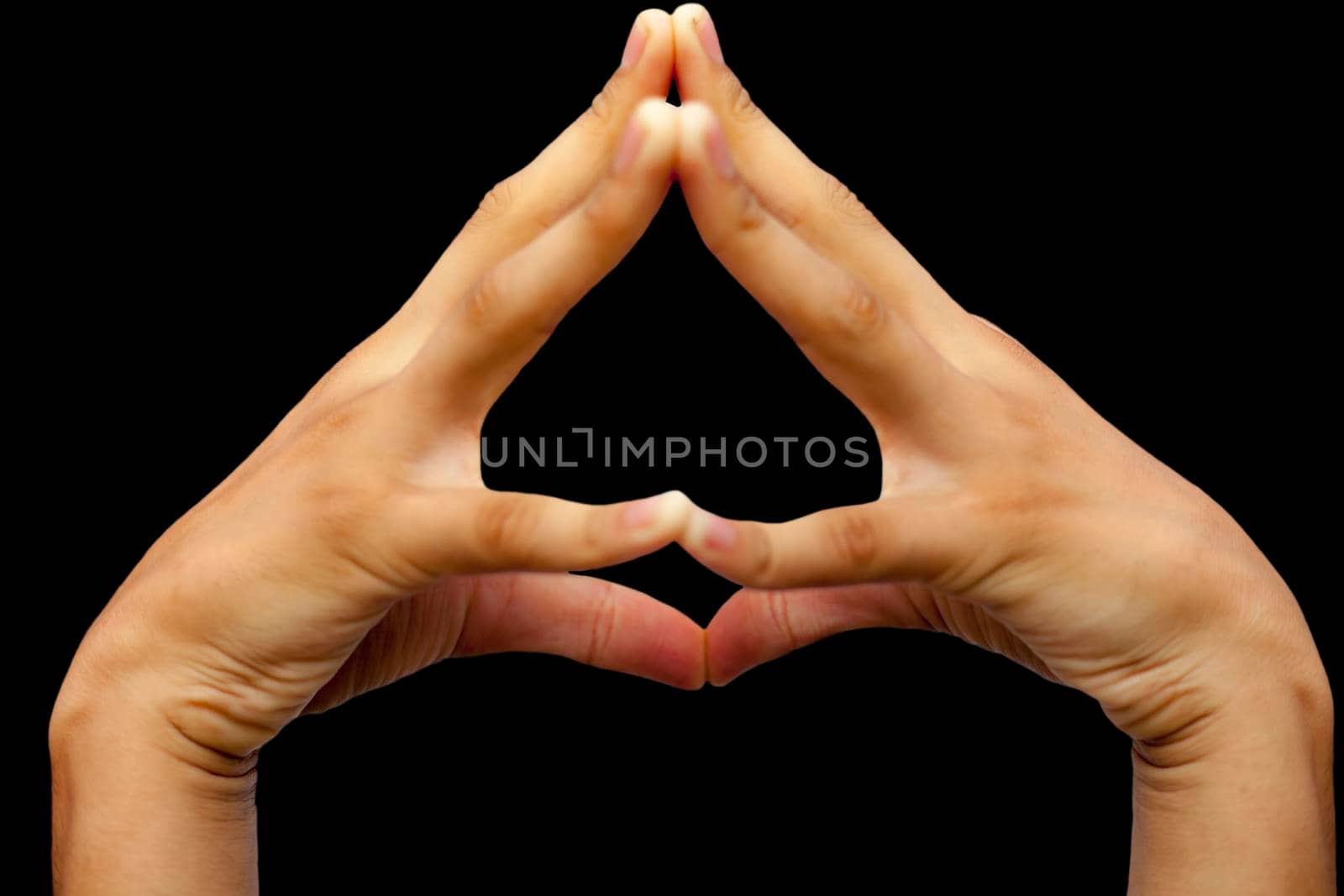 Shot of a human doing Hakini mudra isolated black background. by mirzamlk