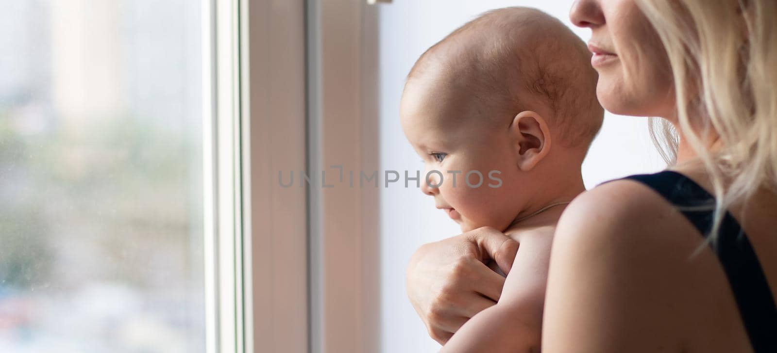 picture of happy mother with baby over white.