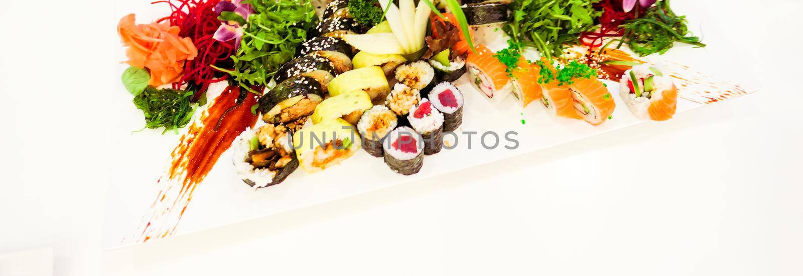 Food, travel and healthy eating concept - Japanese sushi in a restaurant at lunch time, asian cuisine