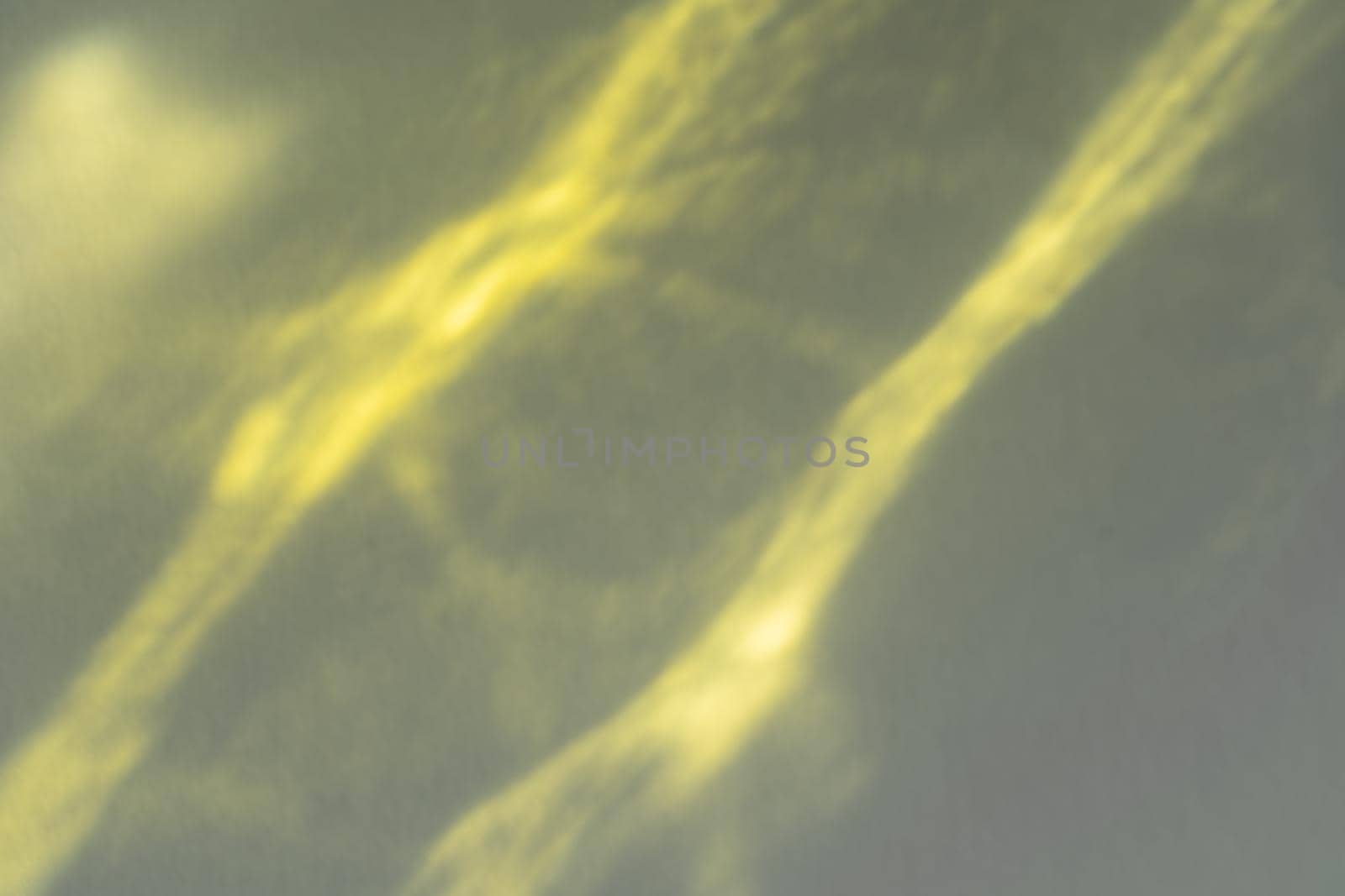 Caustic effect light refraction on yellow wall overlay photo mockup, blurred sun rays refracting through glass prism with shadow. Abstract natural light refraction silhouette on water surface by photolime