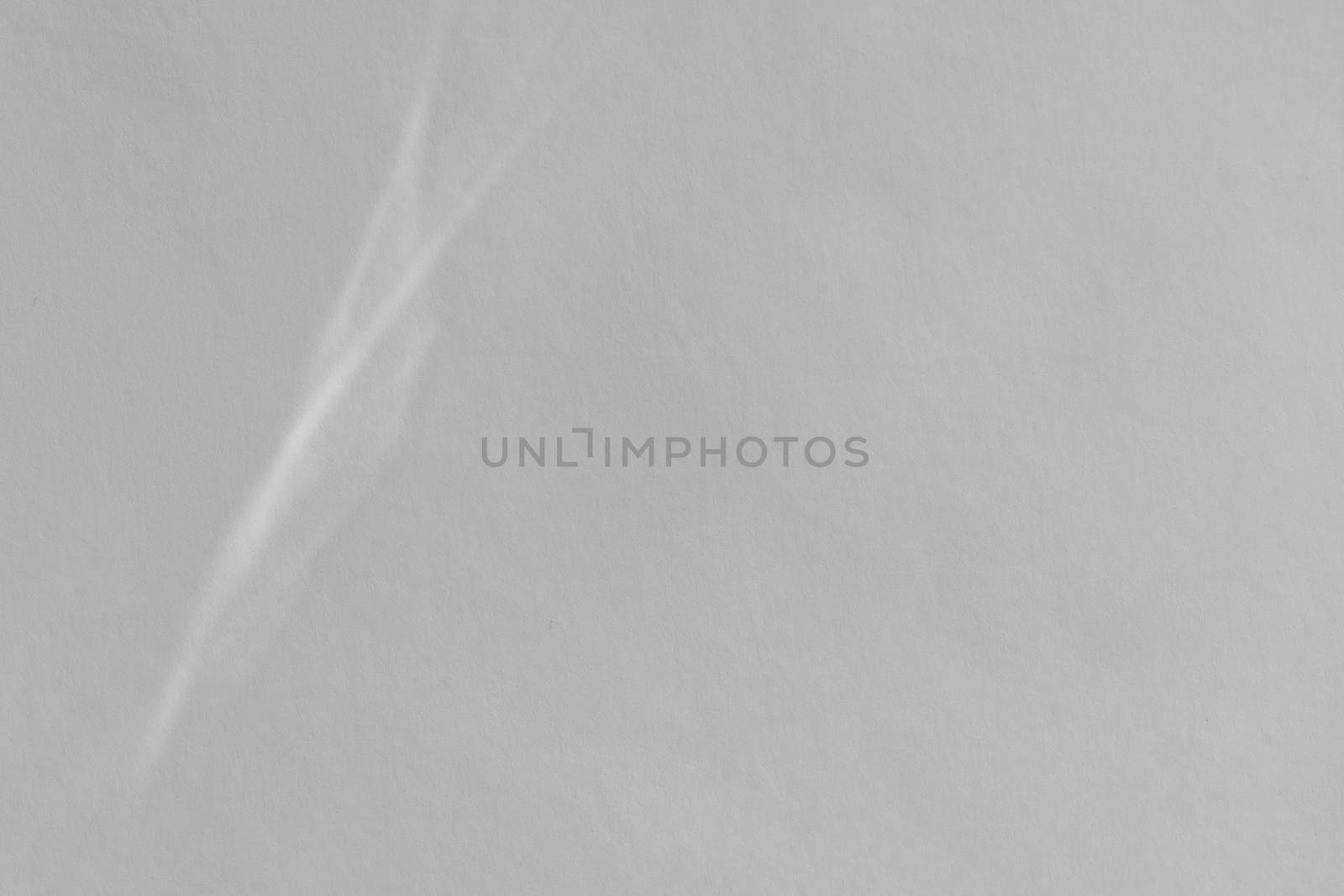 Caustic effect light refraction on white wall overlay photo mockup, blurred sun rays refracting through glass prism with shadow. Abstract natural light refraction silhouette on water surface by photolime