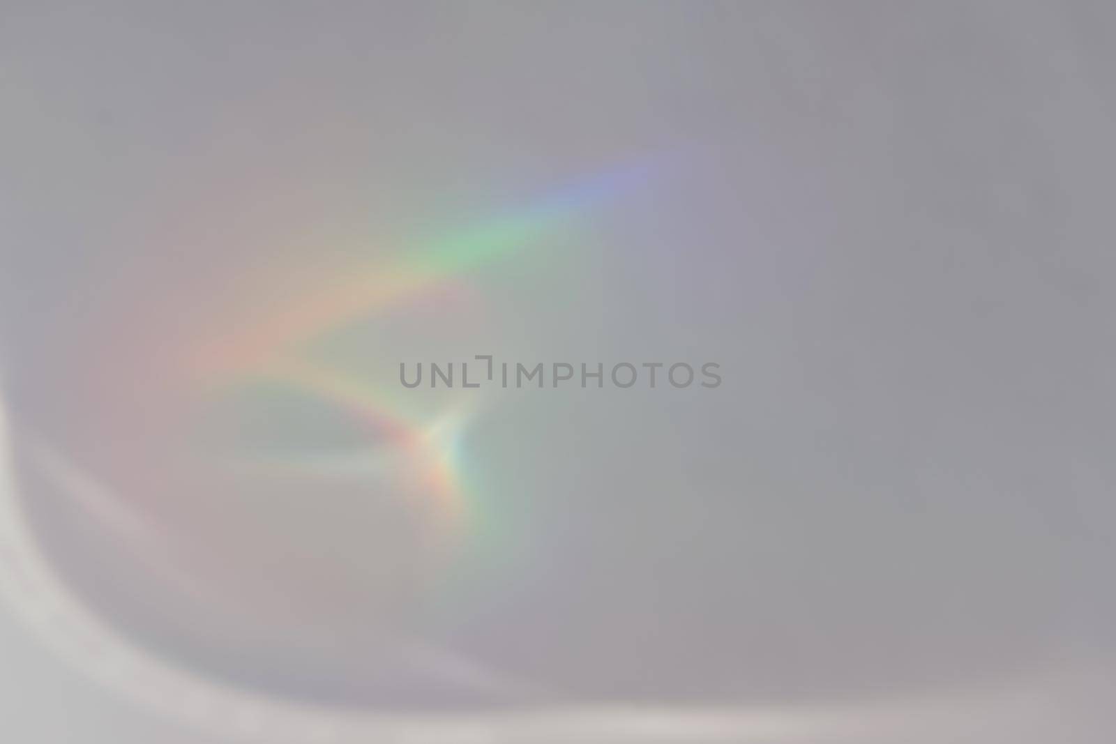 Abstract natural light refraction silhouette on water surface mock up.Caustic effect light refraction on white wall overlay photo mockup, blurred sun rays refracting through glass prism with shadow