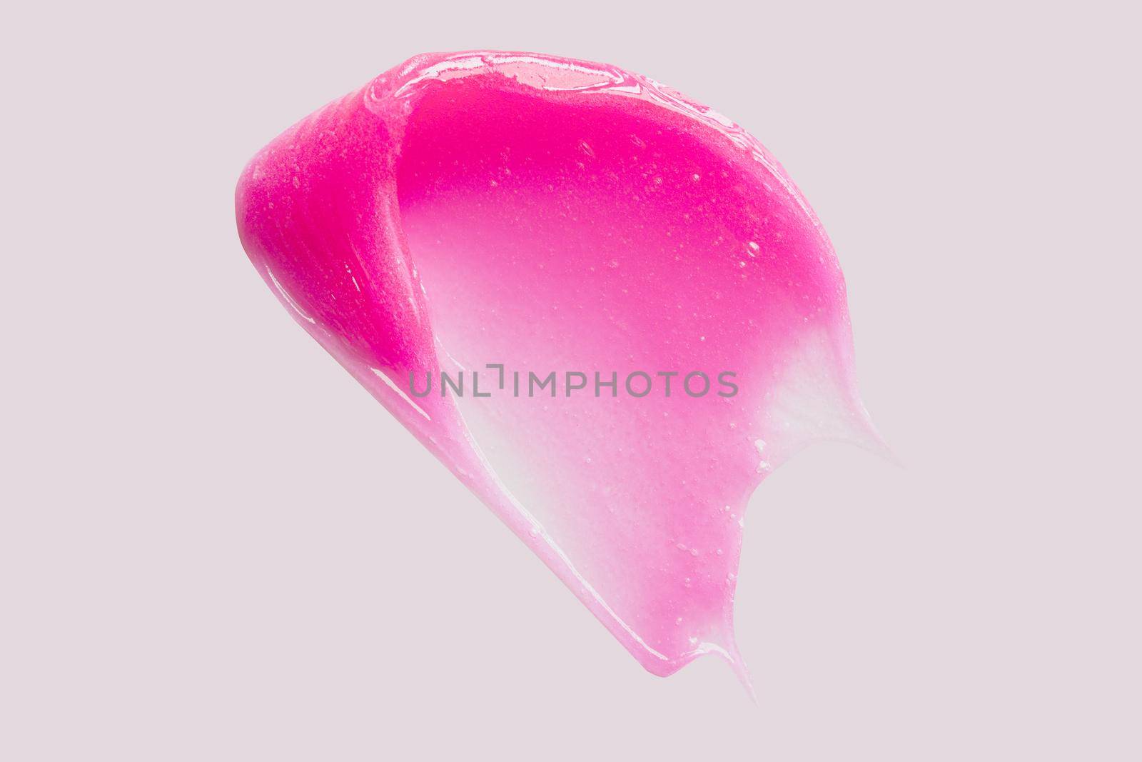 Beauty mask swatch smear smudge isolated on white. Pink face lotion tooth brush moisturiser texture. Skincare product, toothbrush for kids, depilation wax sample cut out
