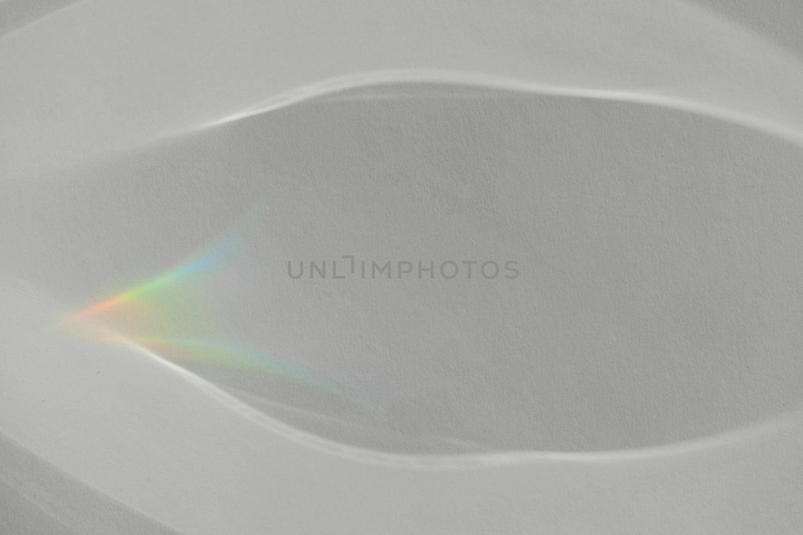 Caustic effect light refraction on white wall overlay photo mockup, blurred sun rays refracting through glass prism with shadow. Abstract natural light refraction silhouette on water surface mock up.