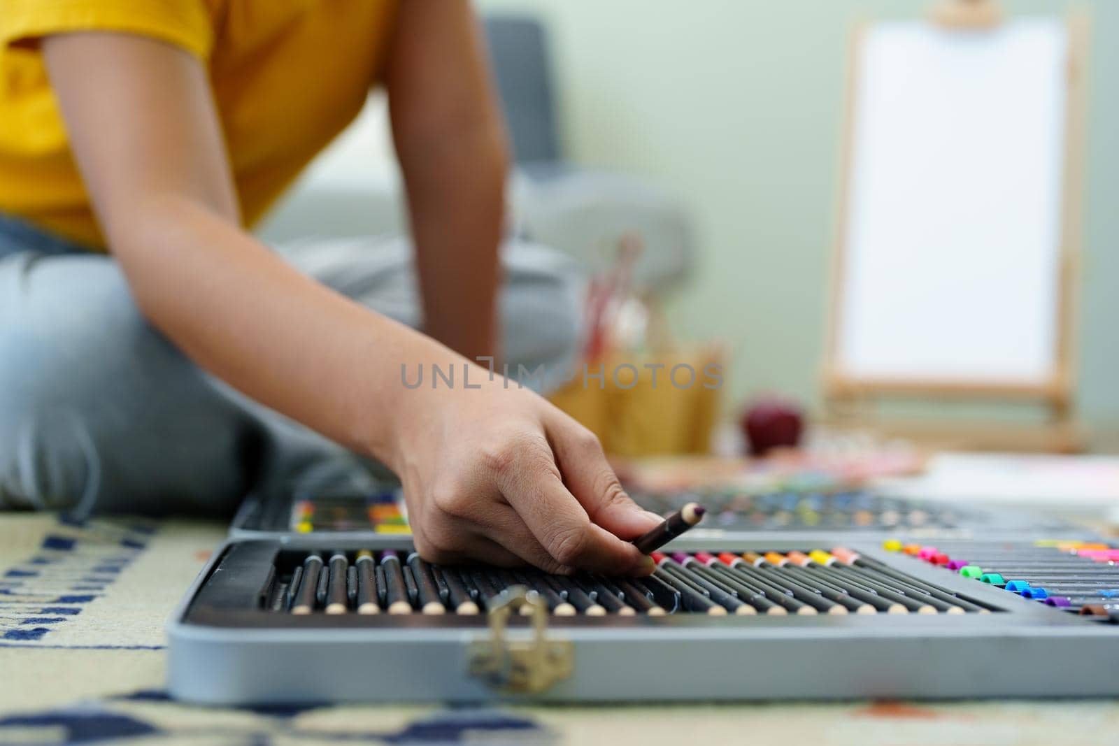 Portrait of an Asian woman designing art in her spare time. by Manastrong