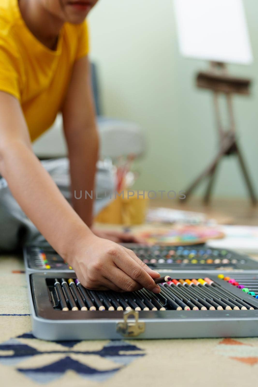 Portrait of an Asian woman designing art in her spare time. by Manastrong