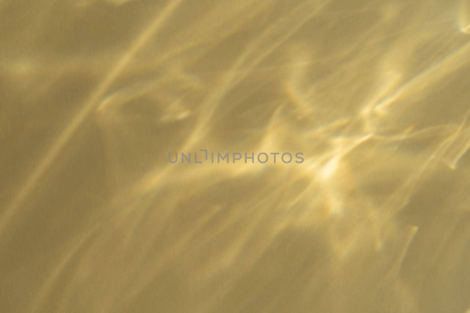 Caustic effect light refraction on yellow wall overlay photo mockup, blurred sun rays refracting through glass prism with shadow. Abstract natural light refraction silhouette on water surface mock up.