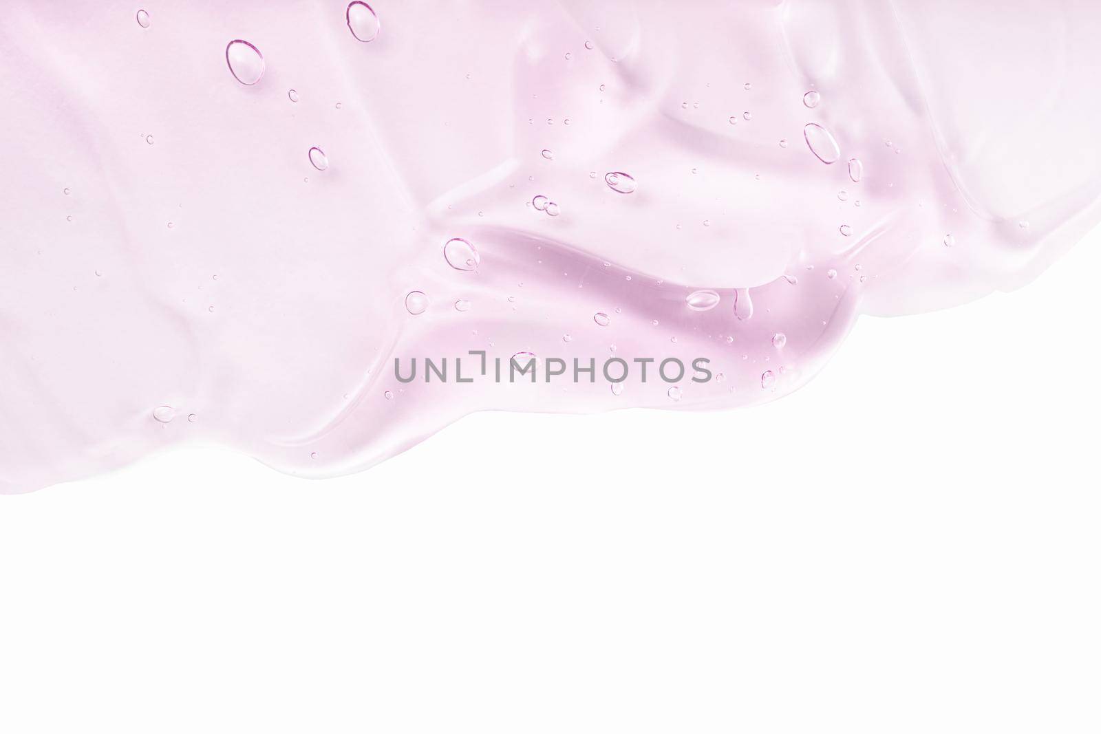 Hyaluronic acid for skin care with collagen and retinol. Pink gel smudge isolated on white background. Skincare lotion face serum. Cosmetic cream transparent purple liquid gel sample swatch