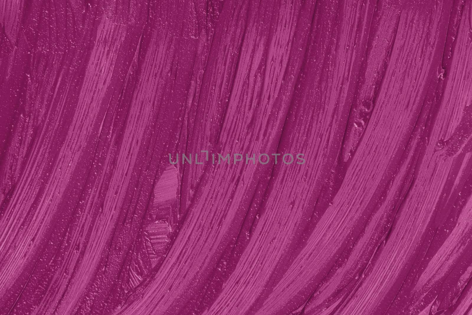 Purple cosmetics smear pattern background. Liquid lipstick cosmetic. Marsala beauty product sample closeup. Pink swatch matt backdrop. Makeup creamy texture. Creamy stroke