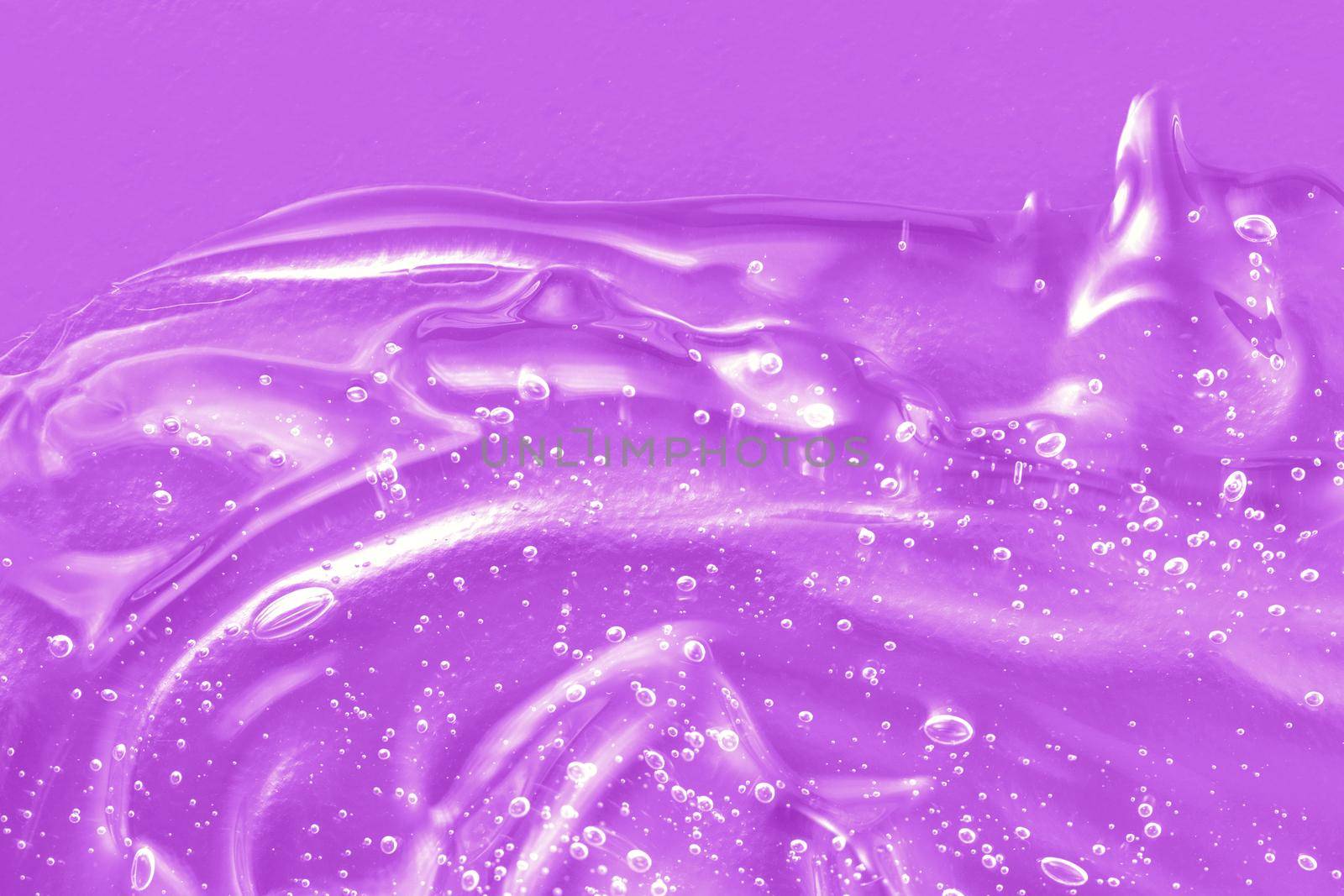 Gel serum liquid texture, cream with collagen and retinol, shampoo sample. Cosmetic for skincare. Antibacterial disinfect smear smudge. Lilac sanitizer swatch with bubbles. Close-up, macro.