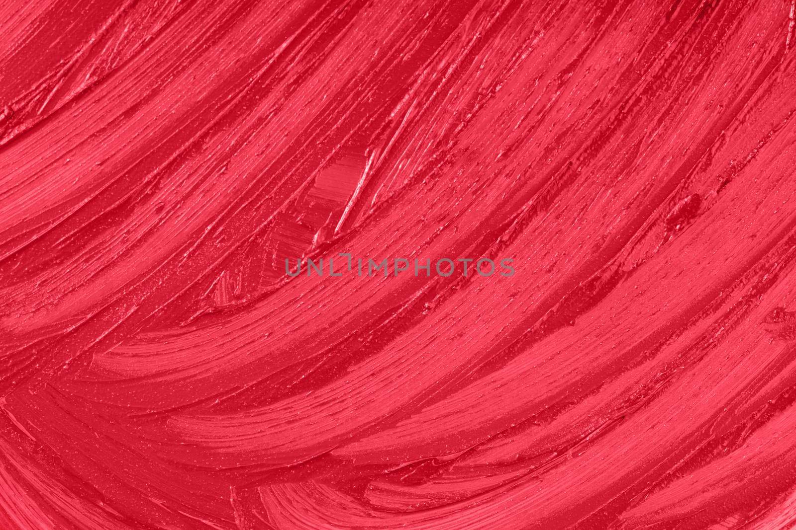 Liquid beauty cream close up. Red lipstick smear smudge sample texture background. Beauty product lop gloss closeup. Makeup creamy backdrop.