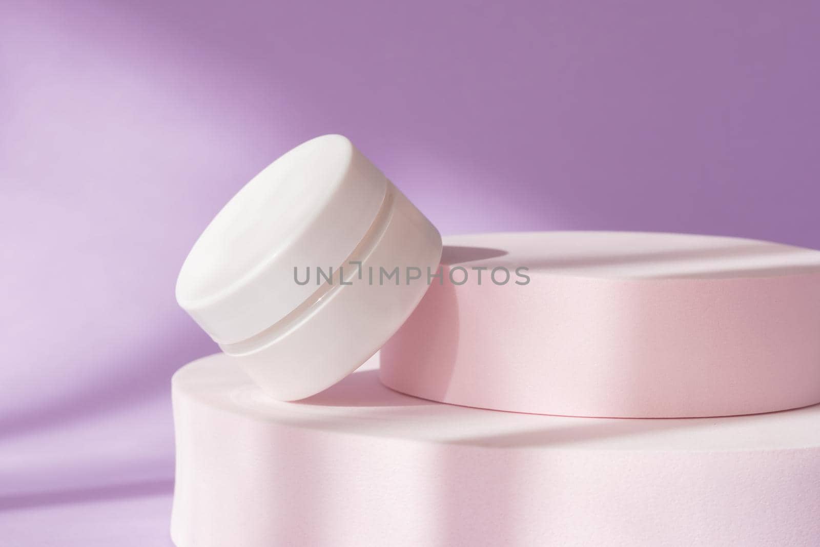 Beauty cosmetic cream jar mockup on purple podium showcase. White package container on pedestal, windows shadow background. Blank skin care product template, luxury skincare body moisturizer, mask