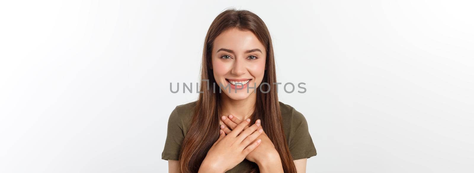 Close-up portrait of yong woman casual portrait in positive view, big smile, beautiful model posing in studio over white background