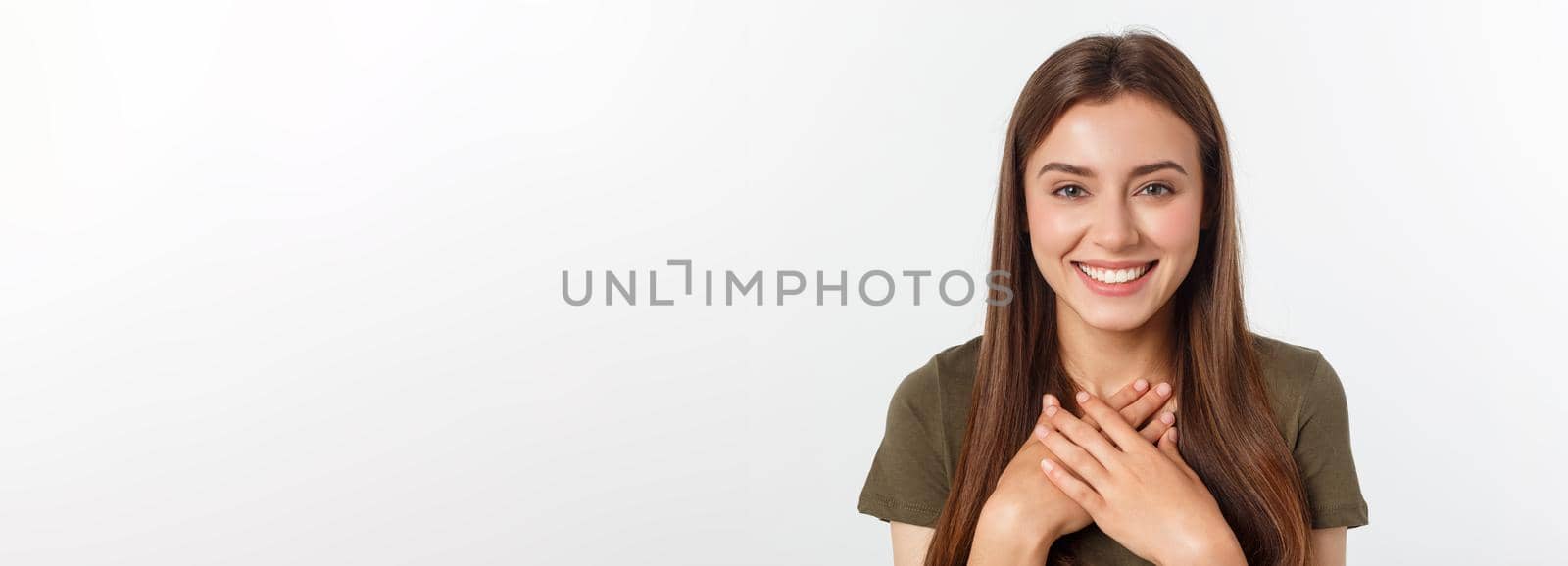 Close-up portrait of yong woman casual portrait in positive view, big smile, beautiful model posing in studio over white background