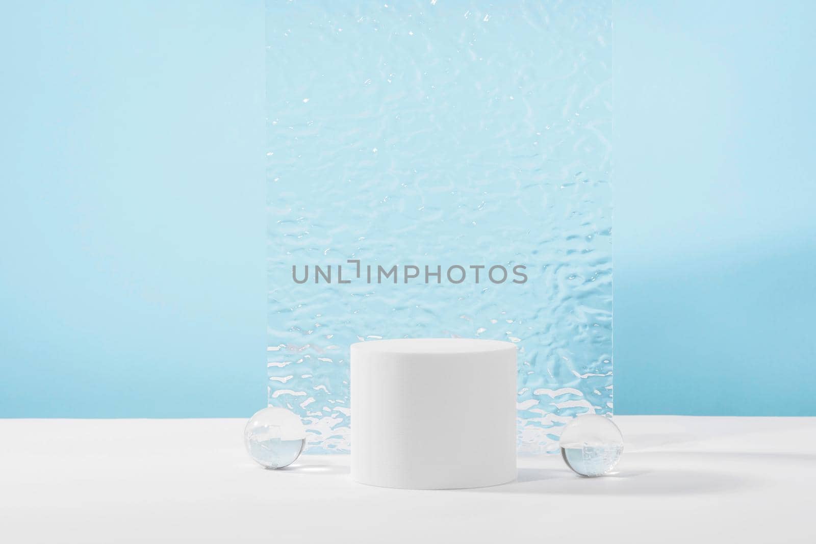 Showcase for jewellery presentation, display for advertising, cosmetics branding scene. Acrylic plate, podium, background for cosmetic product packaging on blue backdrop with stylish props. by photolime