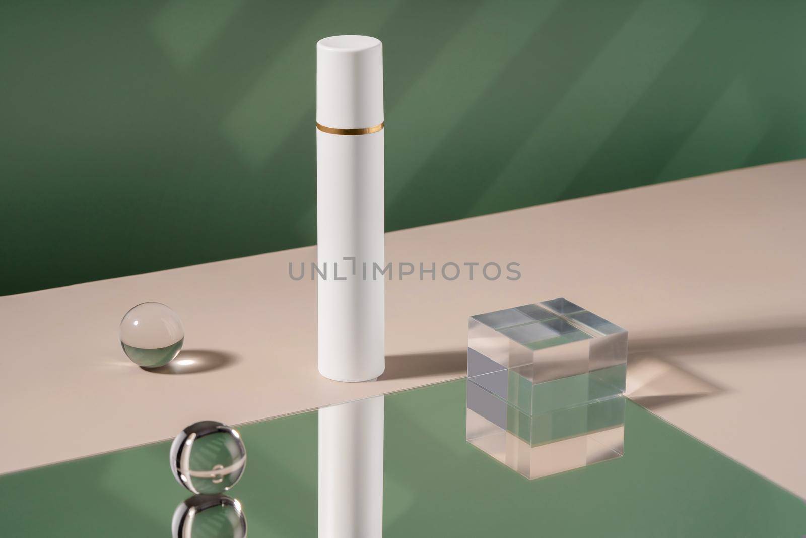 Cosmetic cream bottle mockup showcase product presentation with stylish props. Display mock up for advertising, cosmetics stand, branding scene with ball mirror, shadow light on green backdrop