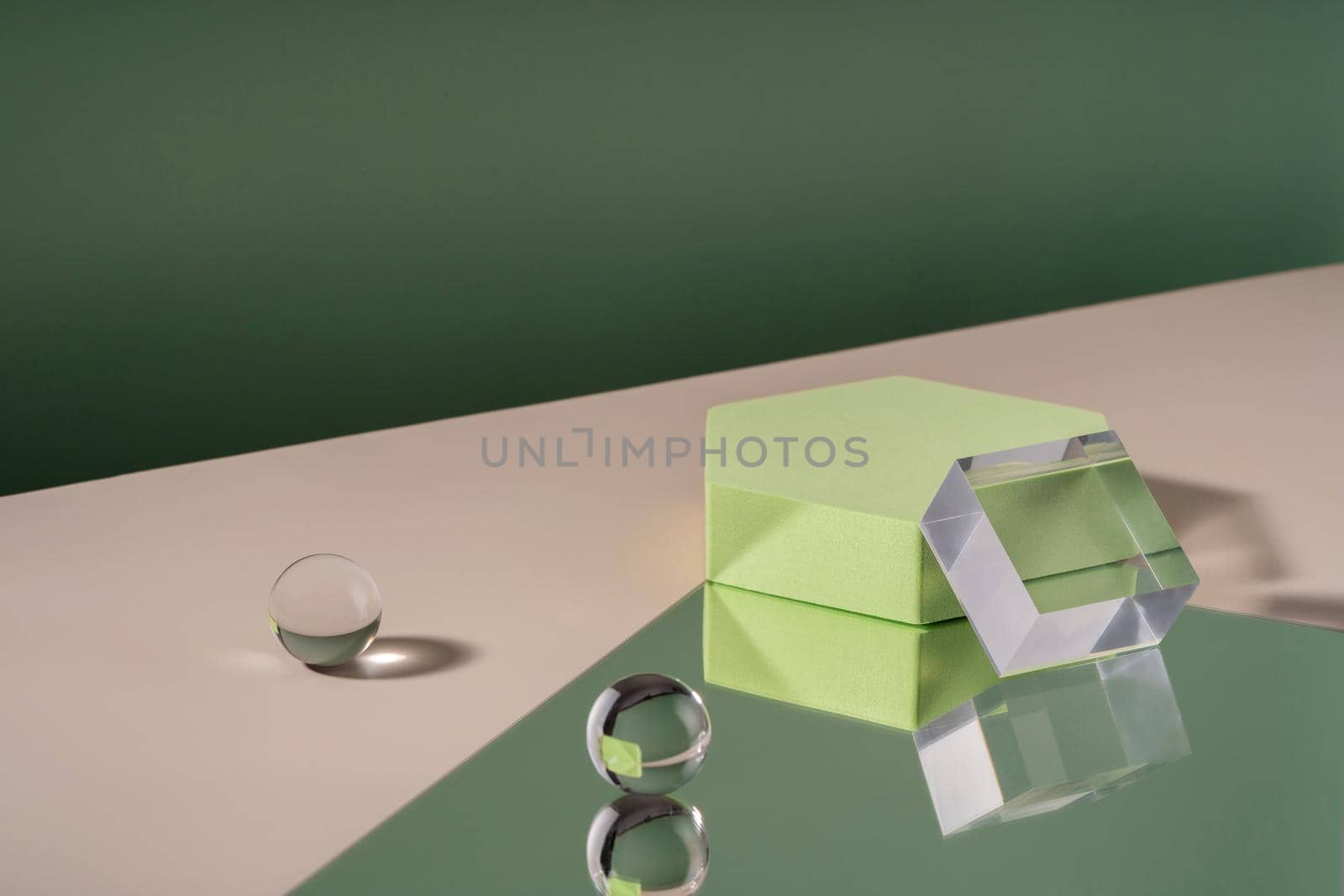 Pedestal cosmetic display hexagon podium platform with stylish props for product presentation, cosmetics geometric stand, mockup scene for jewellery. Platform, balls and mirror on green background