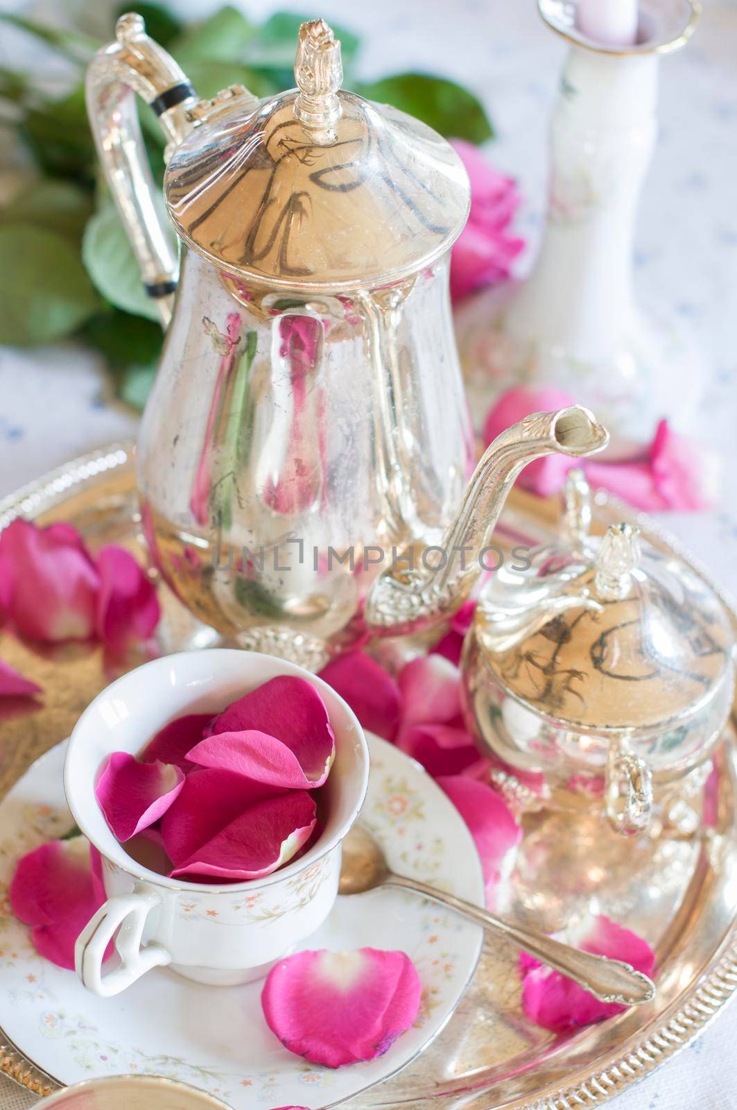 Tea break in English style, vintage silver service against the background of New Year's decor, festive still life, shallow depth of field, light and air