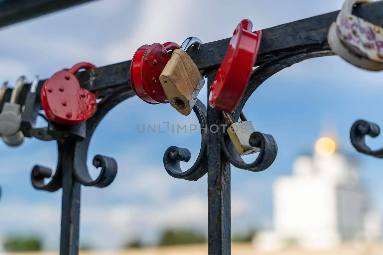locks for luck on the bridge. A tradition Wedding locks for good luck. Binding of marital ties. Love locks concept. The railing of the bridge with love locks. The oath of the newlyweds in loyalty and love