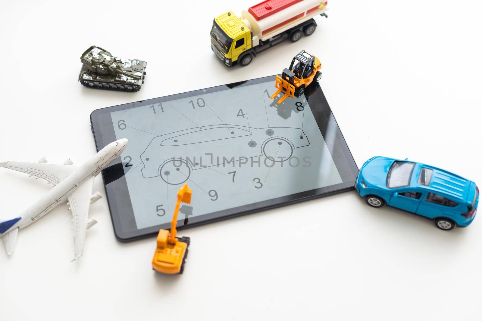 Tablet computer with different types of toy transport.